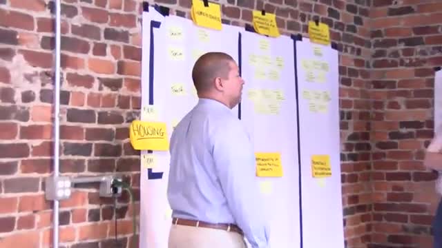 Council retreat surfaces split over single comprehensive shelter versus distributed low‑barrier sites