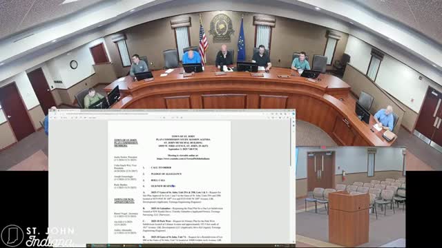 Planning commission reviews Gates of Saint John site plans, including drive‑through tenant and downtown layout