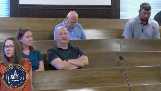 Commissioners approve funding counsel after absent sheriff warns of payroll shortfall