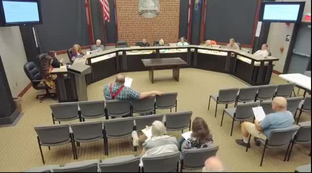 Resident raises flooding and driving-safety concerns at bottom of North Duke Street