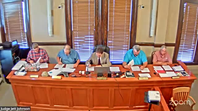 Commissioners approve sheriff’s training‑reimbursement agreement despite budget concerns