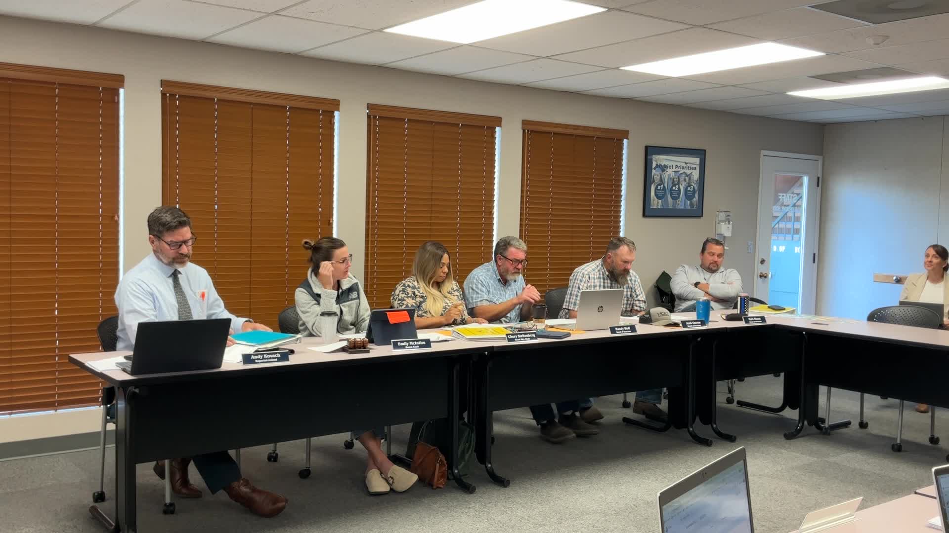 Eagle Point staff present PED (cell‑phone) plan: phones to stay in backpacks at school with medical exceptions