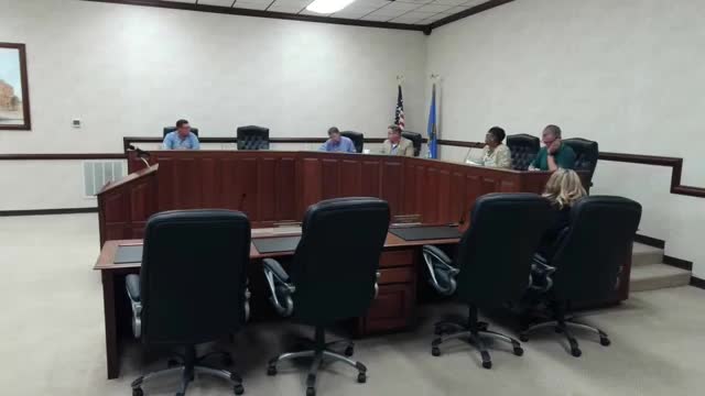 Council and industrial authority discuss rezoning parcels to R-2 for potential multi-family housing; decisions postponed