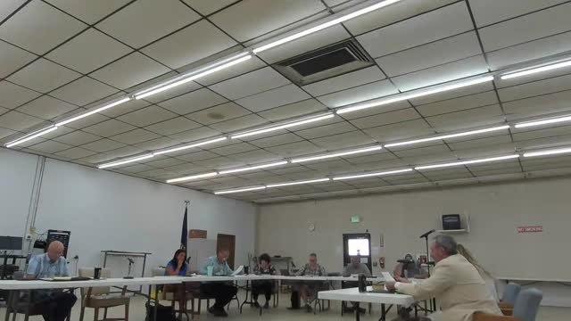 Commissioners debate plan to restructure county development and building services; staff raise concerns about timing, authority and budget impacts