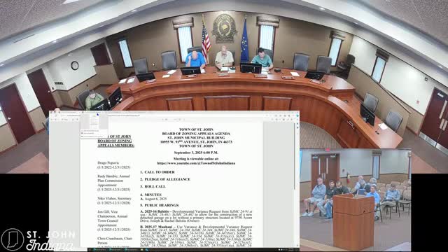 Board approves variance for detached garage on lot without primary structure