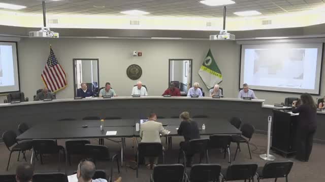 Applicant seeks variances for Kanesville at Eastland; staff opposes cross‑access and material requests