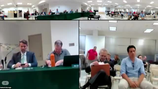 Borough council delays zoning votes, directs planning commission to study transit‑oriented and "missing‑middle" housing