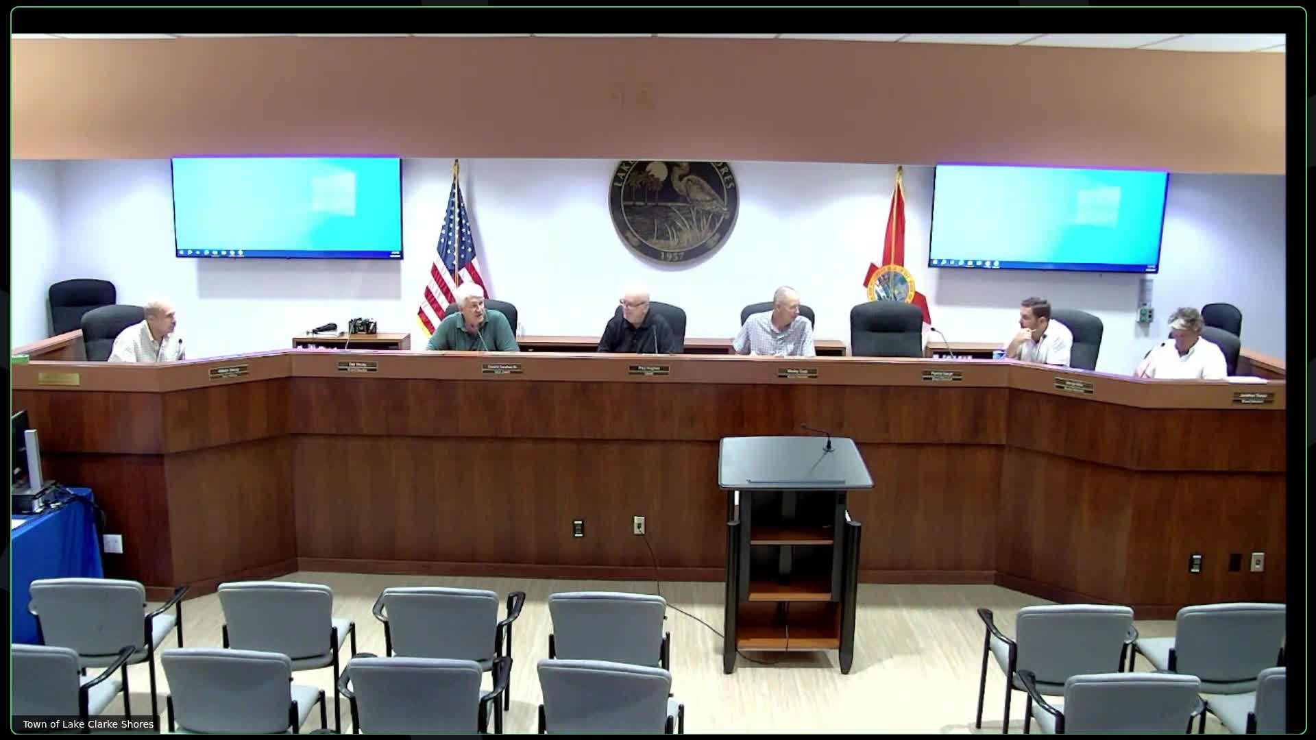 Lake Clark Shores board debates enforcement and homeowner education after repeated yard-waste piles in streets