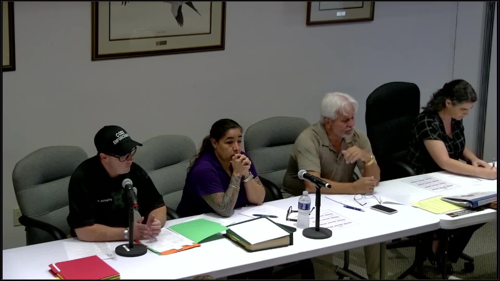 Lake Clark Shores Board Settles Property Dispute Over Shed and Neighbor Complaints