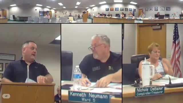 Finance committee awards seal-coating contract for tag center parking lot, opts to change to latex markings to save cost