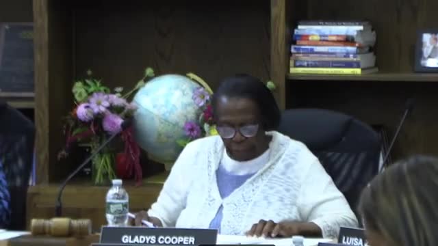 Board approves continuation‑of‑services application for Moore Street Family Resource Center; motion text references North Street