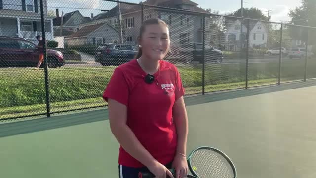 Instructor emphasizes footwork, grip and full-body rotation for forehand at baseline