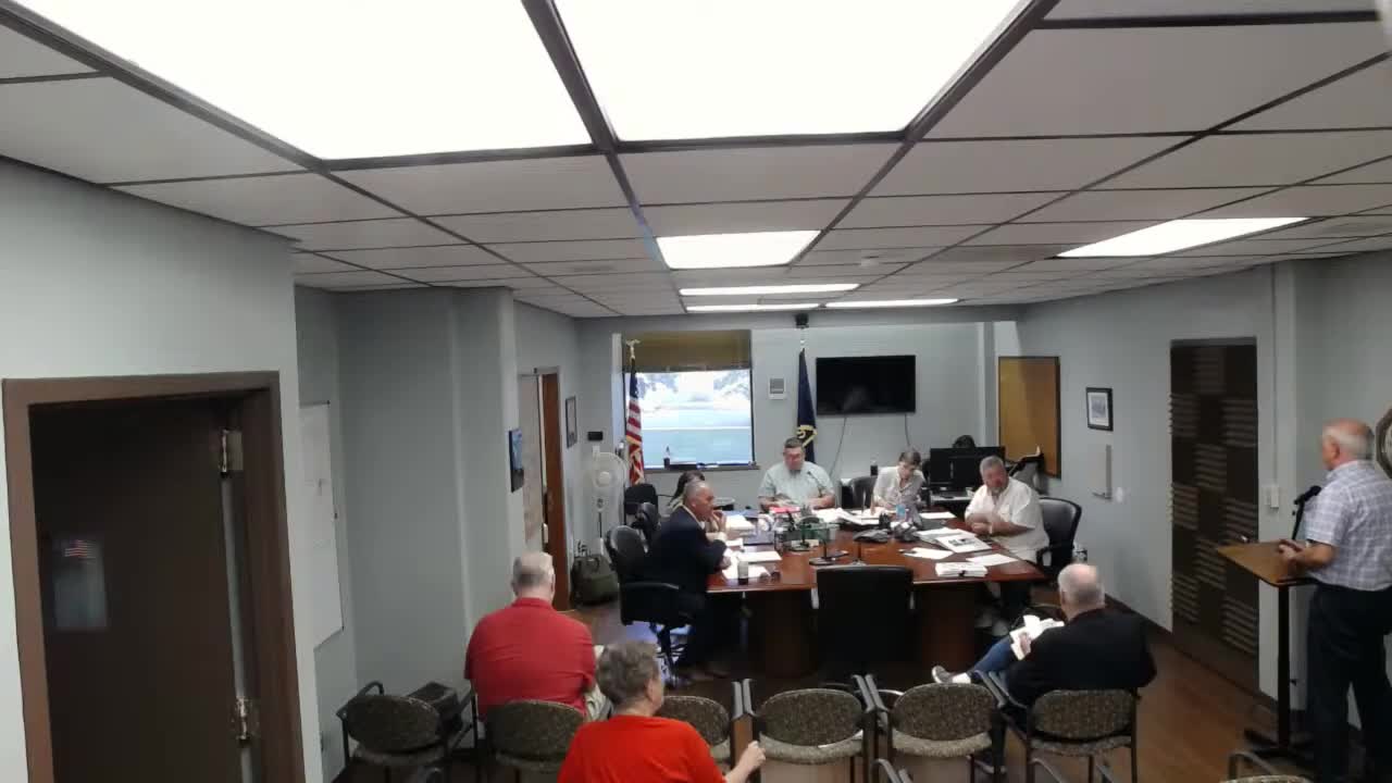 County Commissioners Discuss Budget Adjustments and Employee Health Benefits