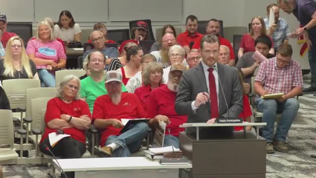 Public commenter accuses central administration of a large pay increase and budget growth; urges transparency