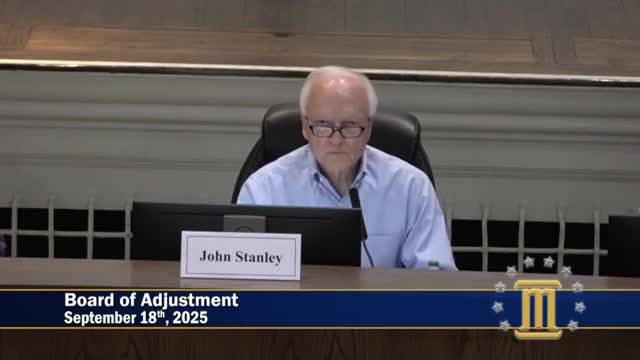 Board grants variance for accessory garage at Casada Ferry Road after petitioner requests retroactive permit