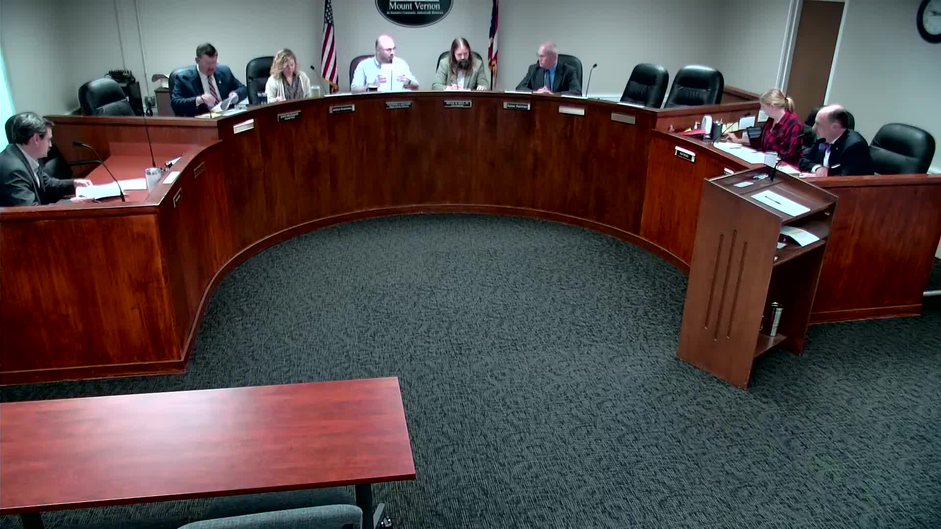 Commission postpones third reading on backflow and FOG changes; staff to refine permits and petroleum‑oil approach