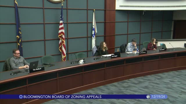 Board approves driveway variance for Lindbergh property because karst easement blocks alley access