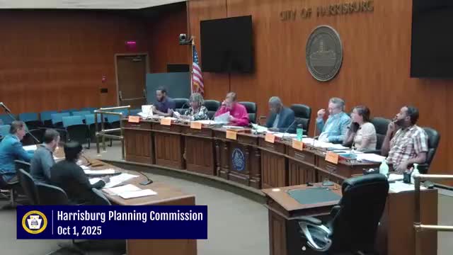 Commission approves conversion of 1909 North Front Street office building into 60 residential units; land‑development conditions applied