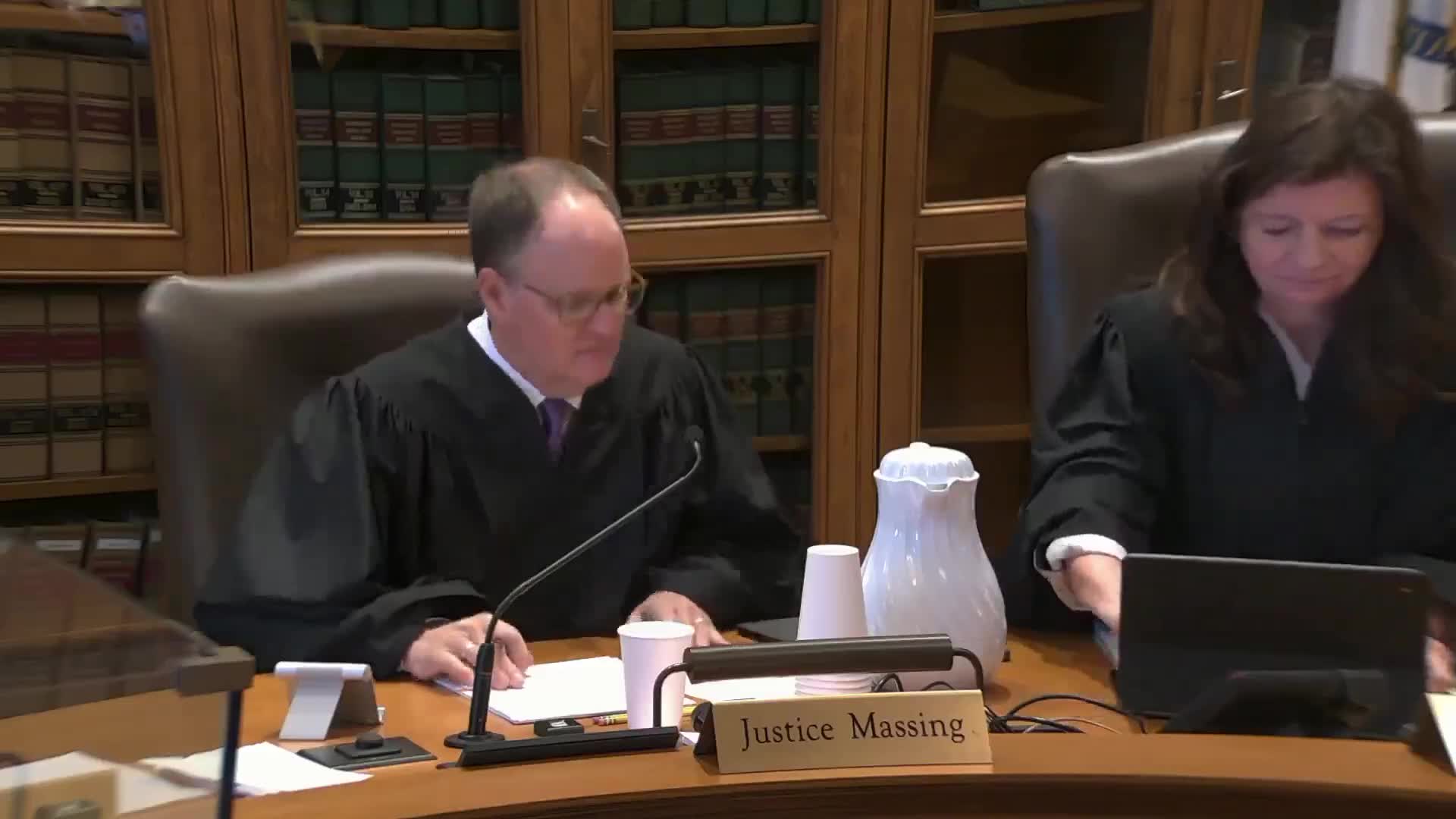 Appeals court hears fee dispute between architect RFA and Carrollton West Pet Hospital over "total cost or estimated cost" language