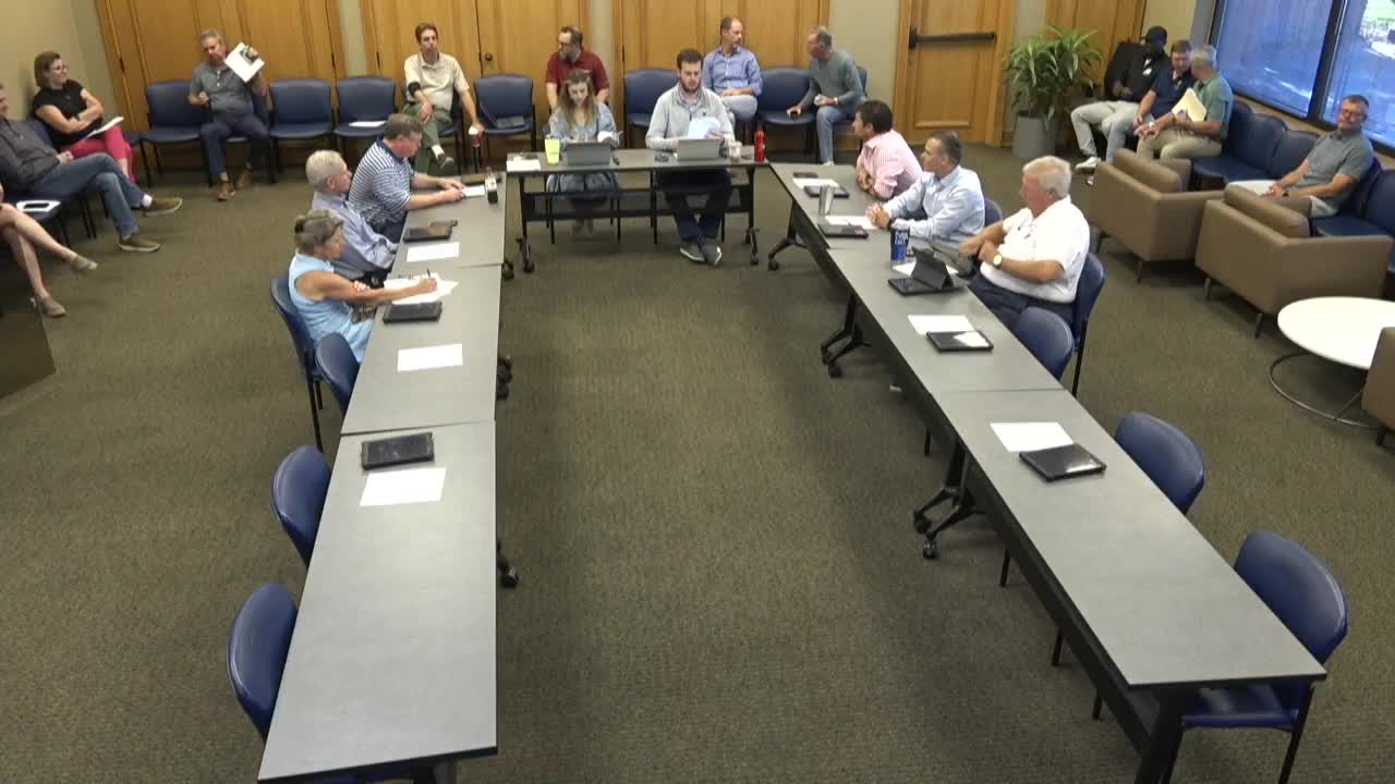 Planning staff clears multiple minor consent items including EV chargers, hotel gate, monument signs and a revised lot plat