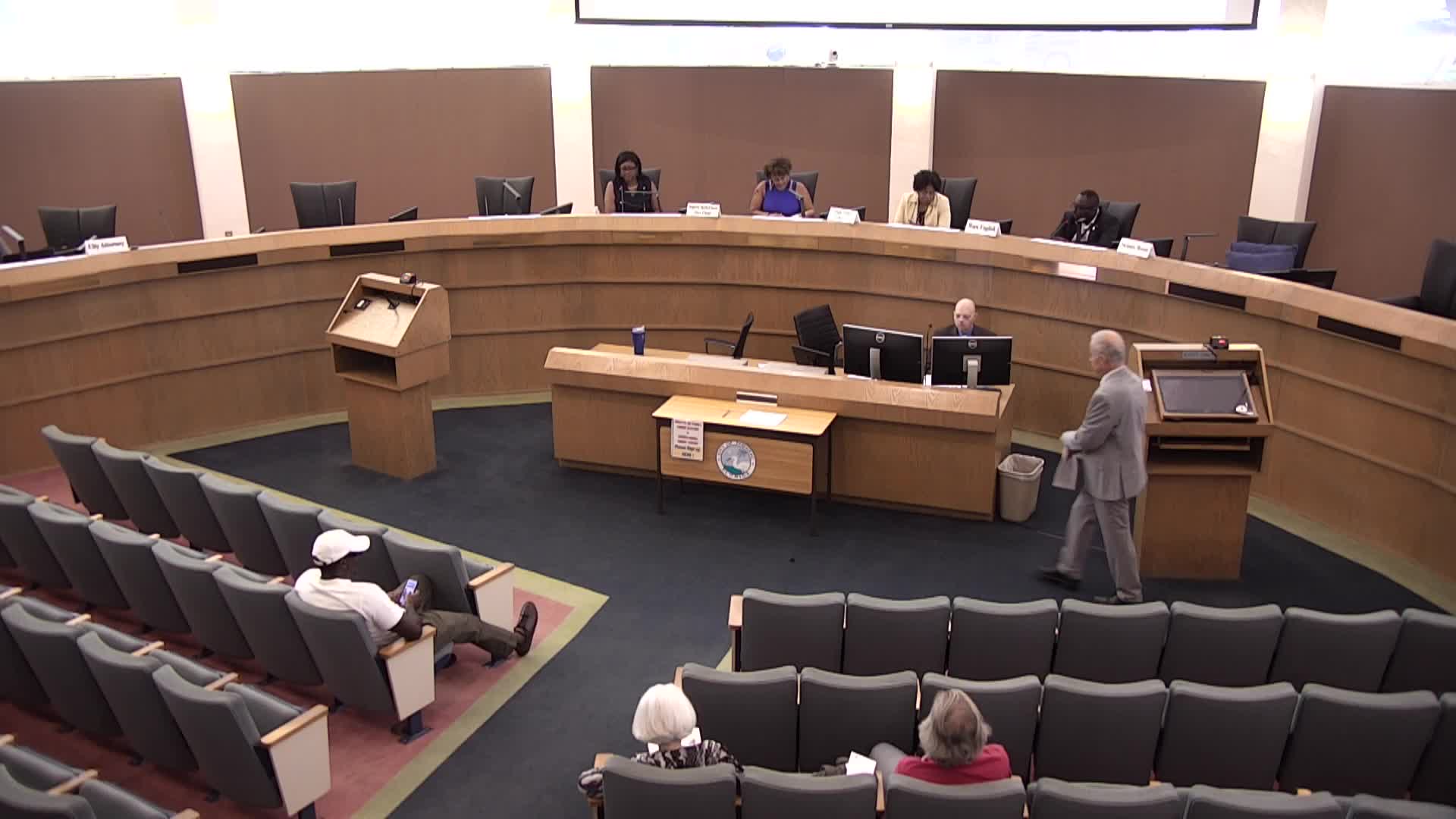 Planning board split on Woodlands lot-coverage variance; motion fails 2-2 and heads to City Commission