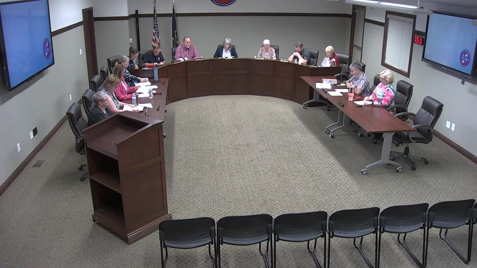 Board approves four support-staff hires