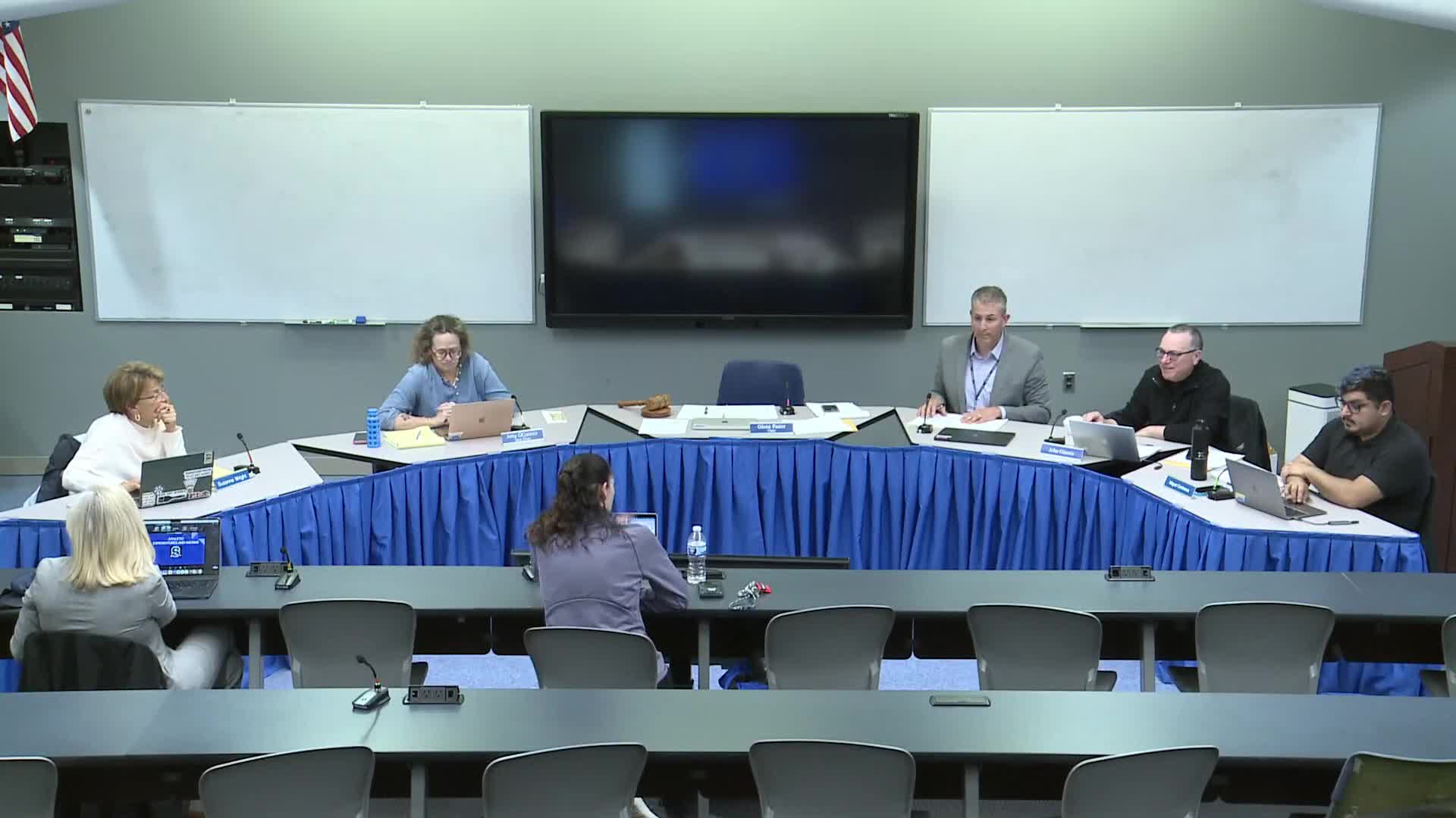 Athletics director details rising costs, unpaid user fees and unsafe track; committee seeks benchmarks for coach stipends