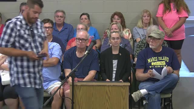 Residents raise conflict-of-interest and safety concerns over Goshen-branded police EV at Manteno festival