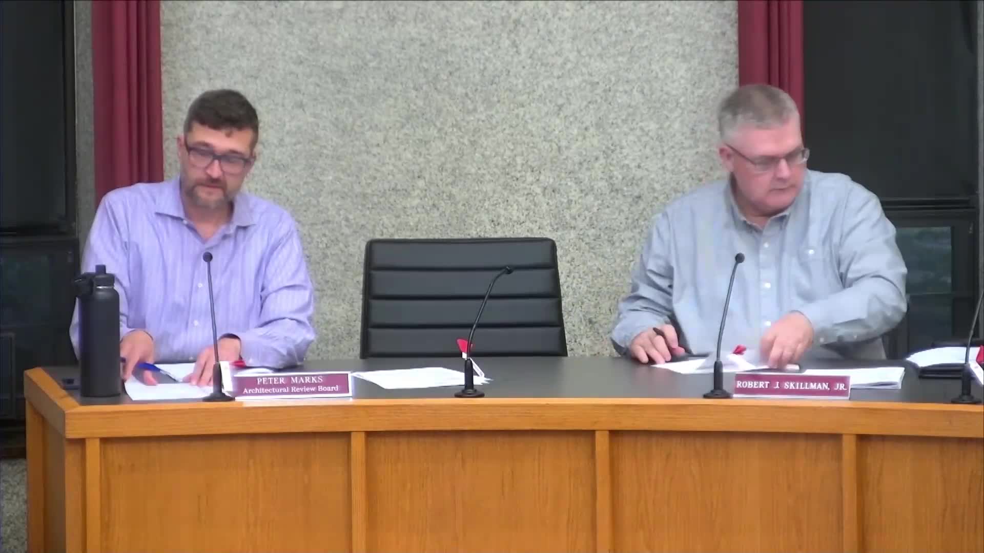 ARB approves redesign of dumpster enclosures and cart corral at 22530 Lakeshore with wood slats, color and landscape review