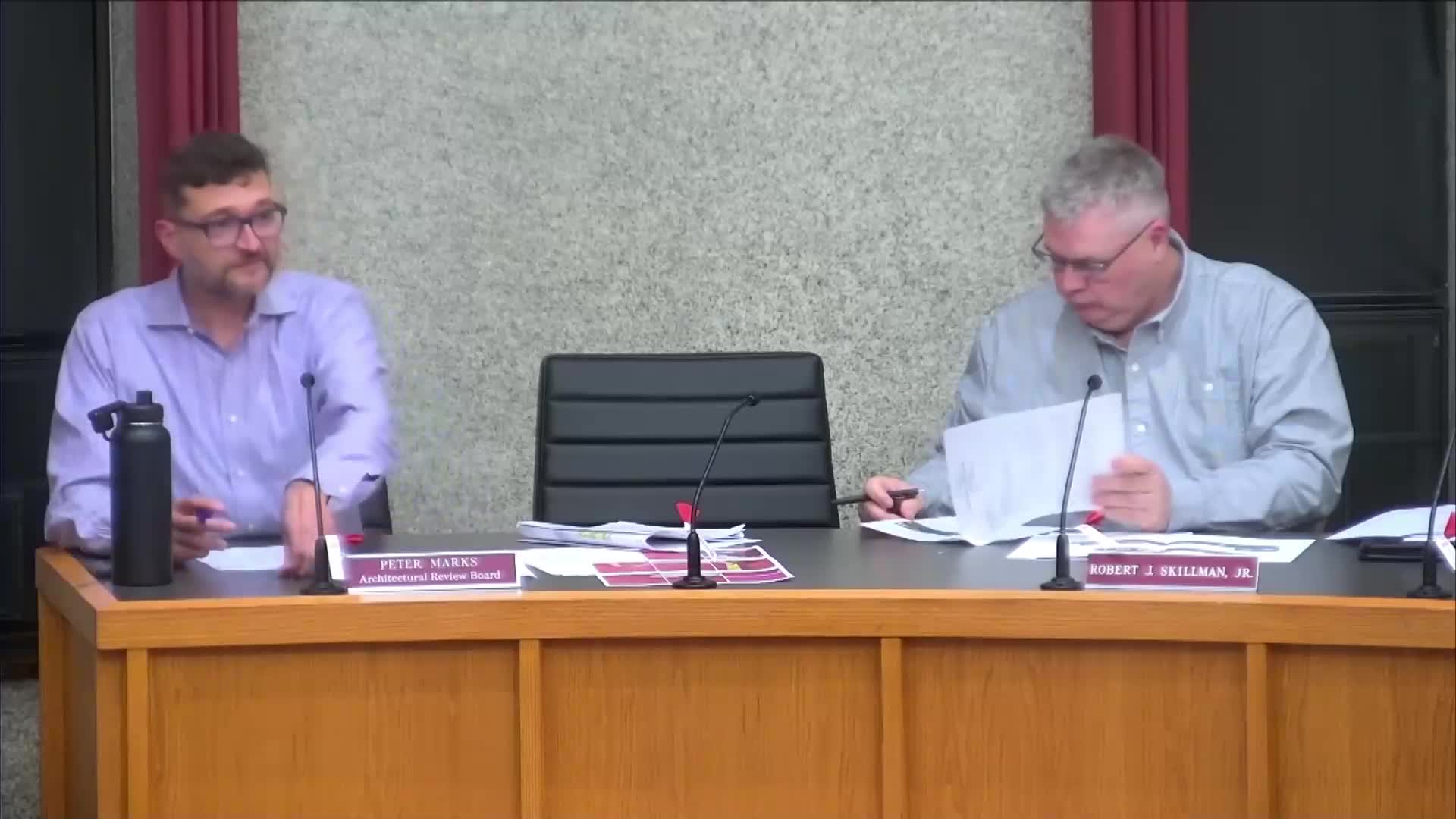 ARB continues retroactive exterior painting review at 434 E. 200 St.; staff asks applicant for color/contrast plans