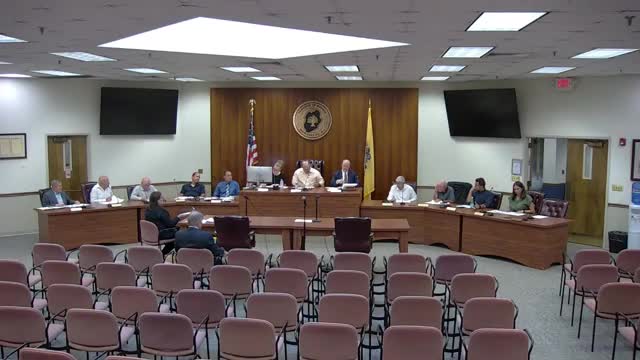 Planning board approves Applegard LLC variance for single retail building, with dissent on traffic study