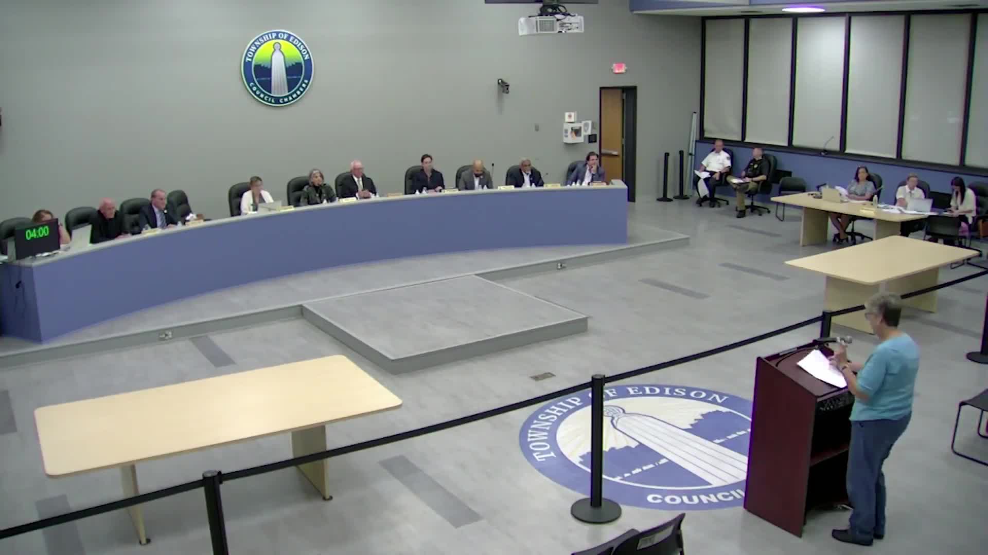 Edison officials report road, senior-center and water-main activity; resident raises debt concern