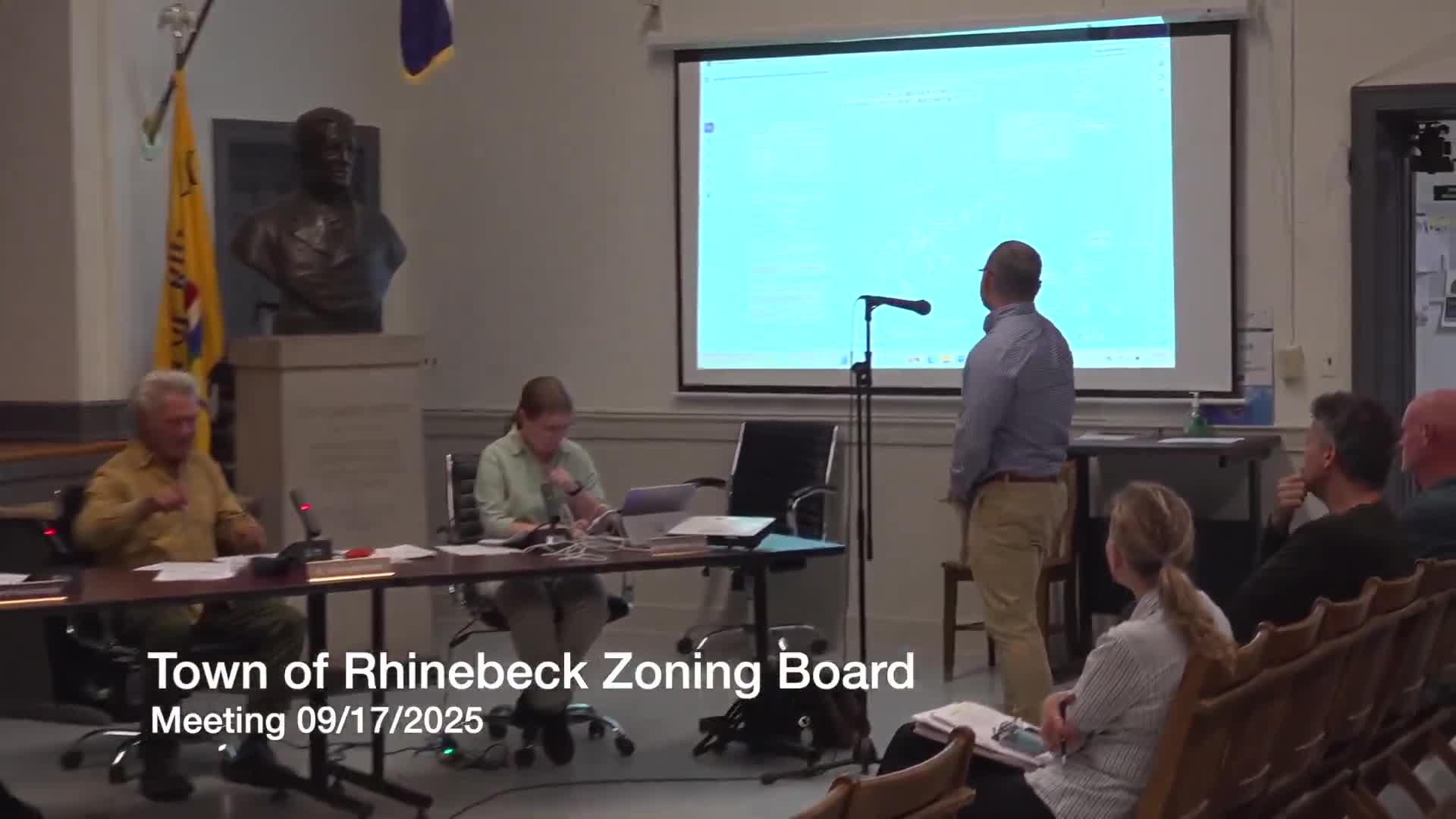 Owner seeks variances for carport and second‑floor deck in Rhinebeck historic district; Planning Board raised no objections