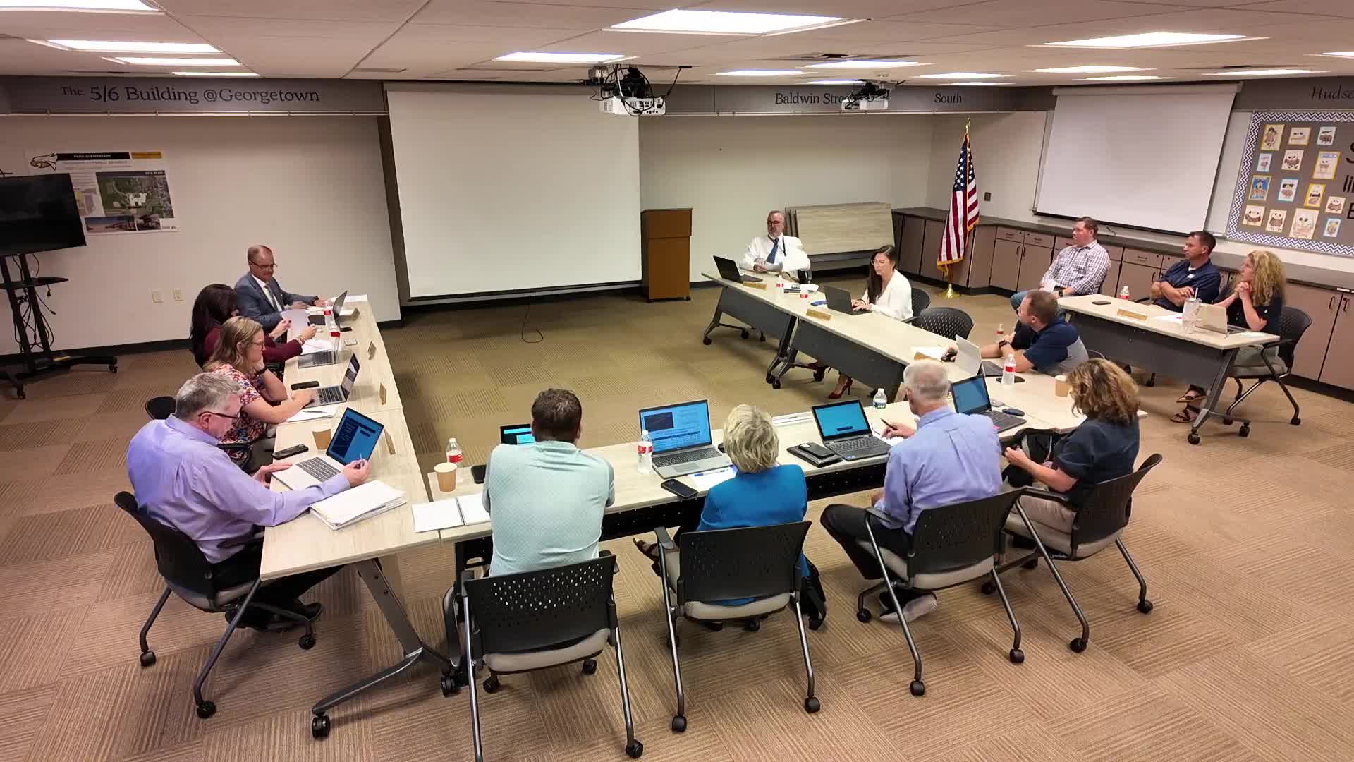 District recommends contracts for early‑childhood playground; low bid $118,000, GSRP prevailing‑wage rules cited