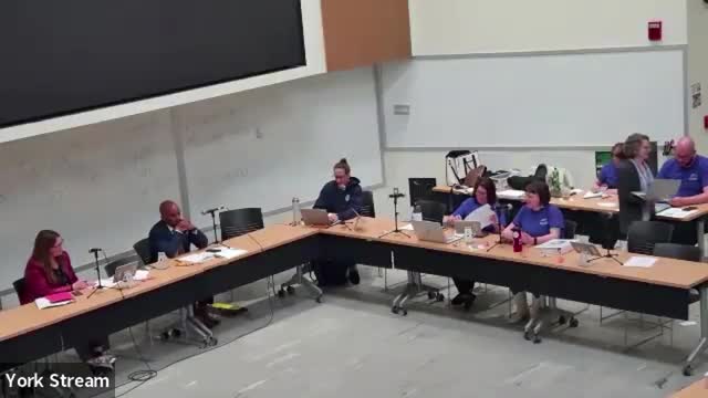 Union and district discuss coordinating curriculum nights; agree to 'every effort' language