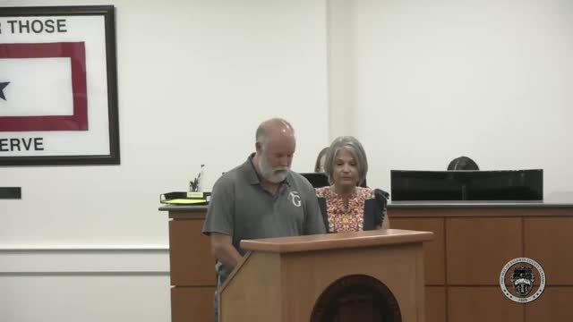 Donor presents $30,000 check for White Park in Bay Minette; Baldwin County meeting accepts donation