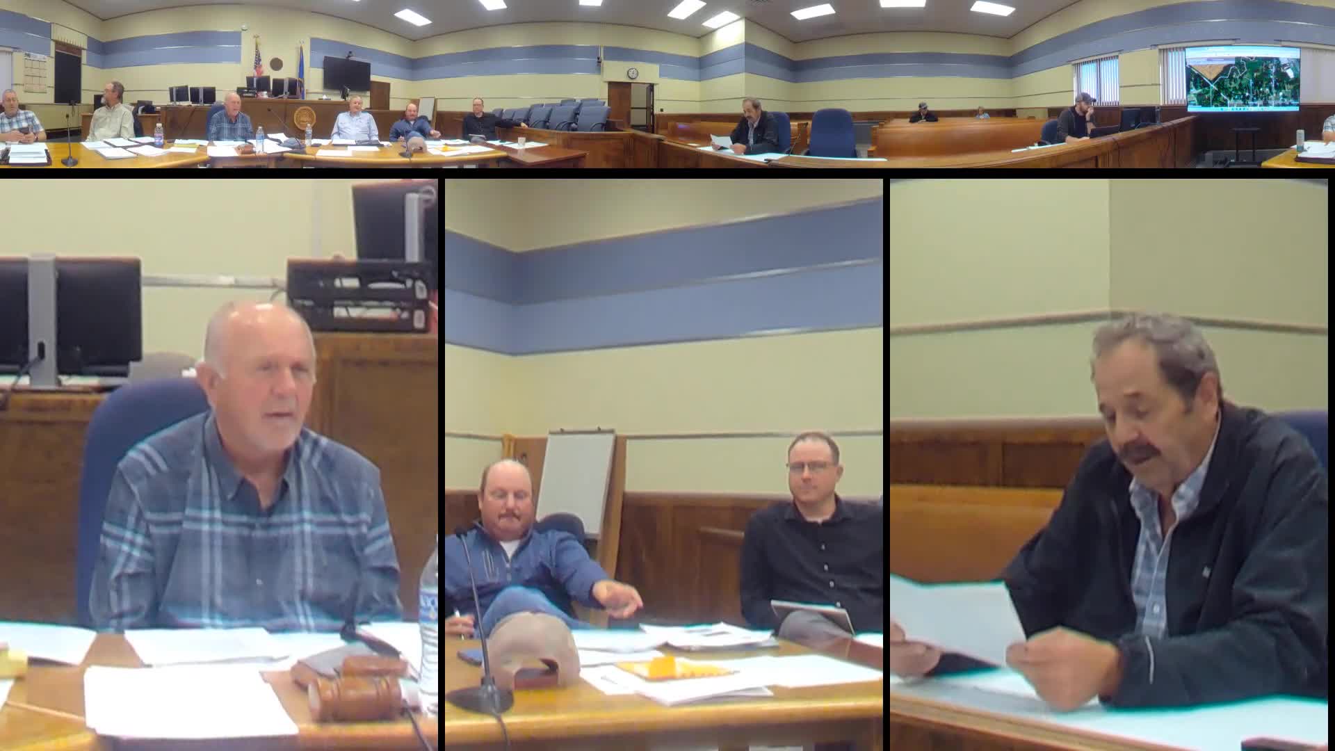 Property owner told to get FEMA no‑rise study or move proposed storage building; annexation and tax assessment dispute raised