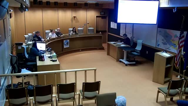 Staff backs temporary two‑space parking variance for phased museum; public hearing next week