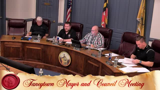 Council adopts city organizational chart after debate over review time