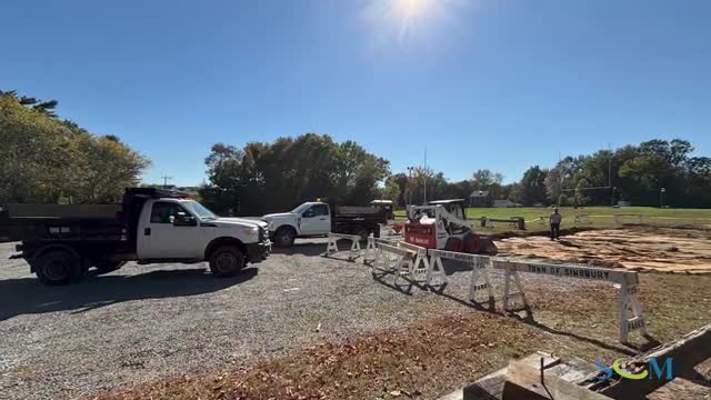 Weetog Park parking-edge playground installed; older play area behind trees to be removed