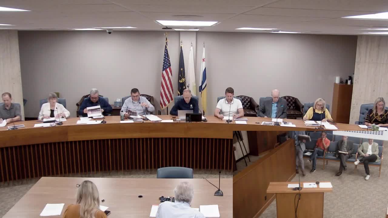 Committee favors amended PUD to match constructed three‑story Legacy Village townhomes and modest occupancy increase