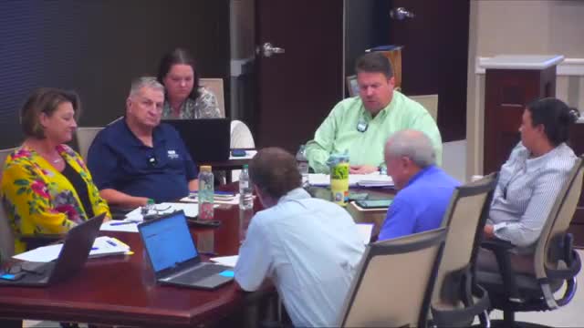 Commission names preferred contractor for elections building; directs negotiations to reduce scope and remove basement