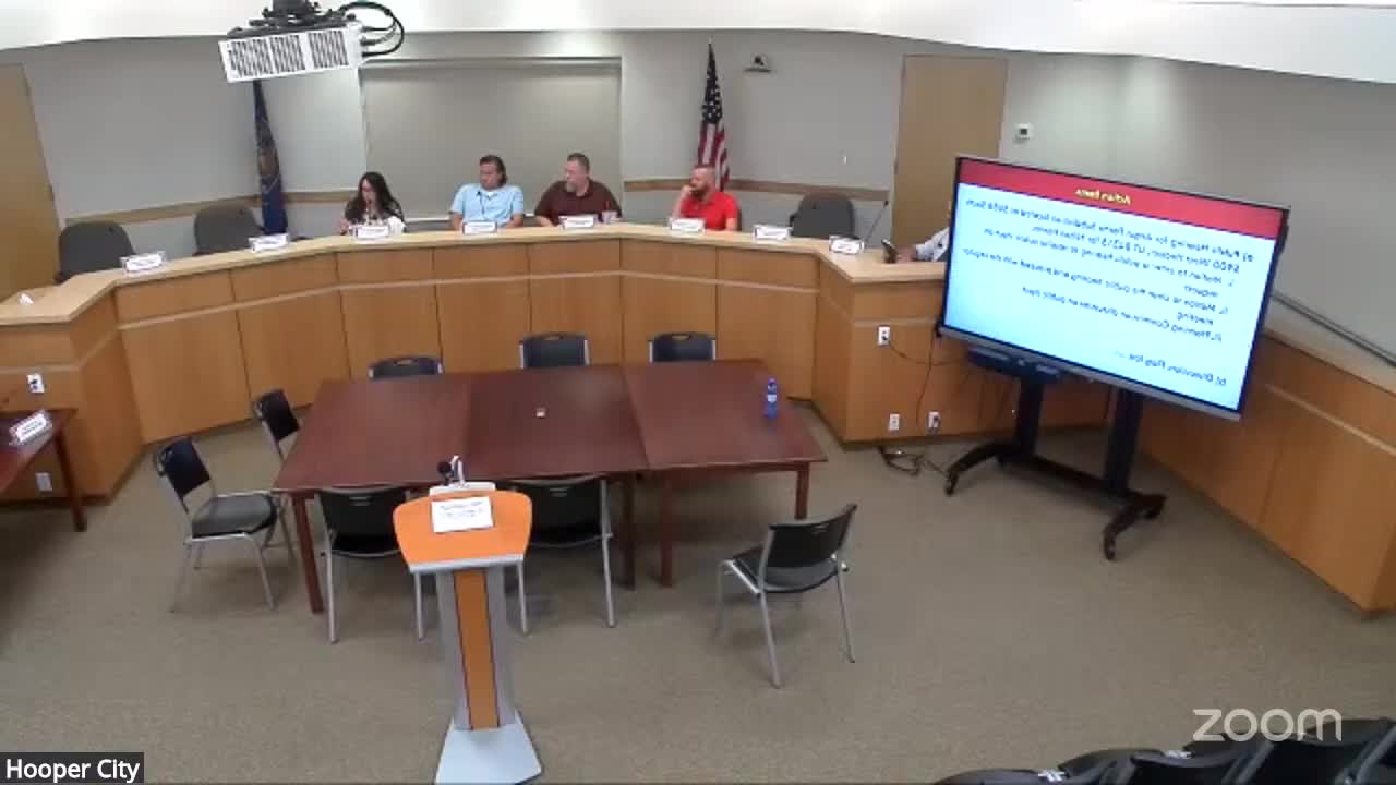 Planning commission reviews 23‑lot subdivision plan, flags frontage, road alignment and irrigation concerns