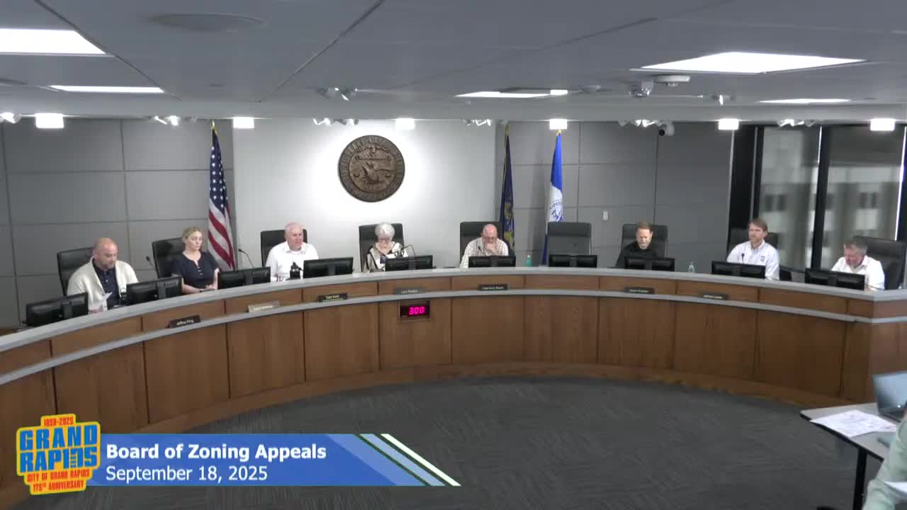 Board grants variances for parking reconstruction at 902 Scribner; applicant to add limited landscaping