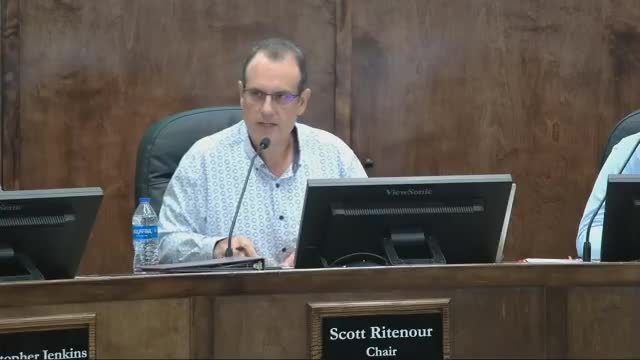 Planners recommend removing parapet exception; seek clearer rule banning signs above roof line