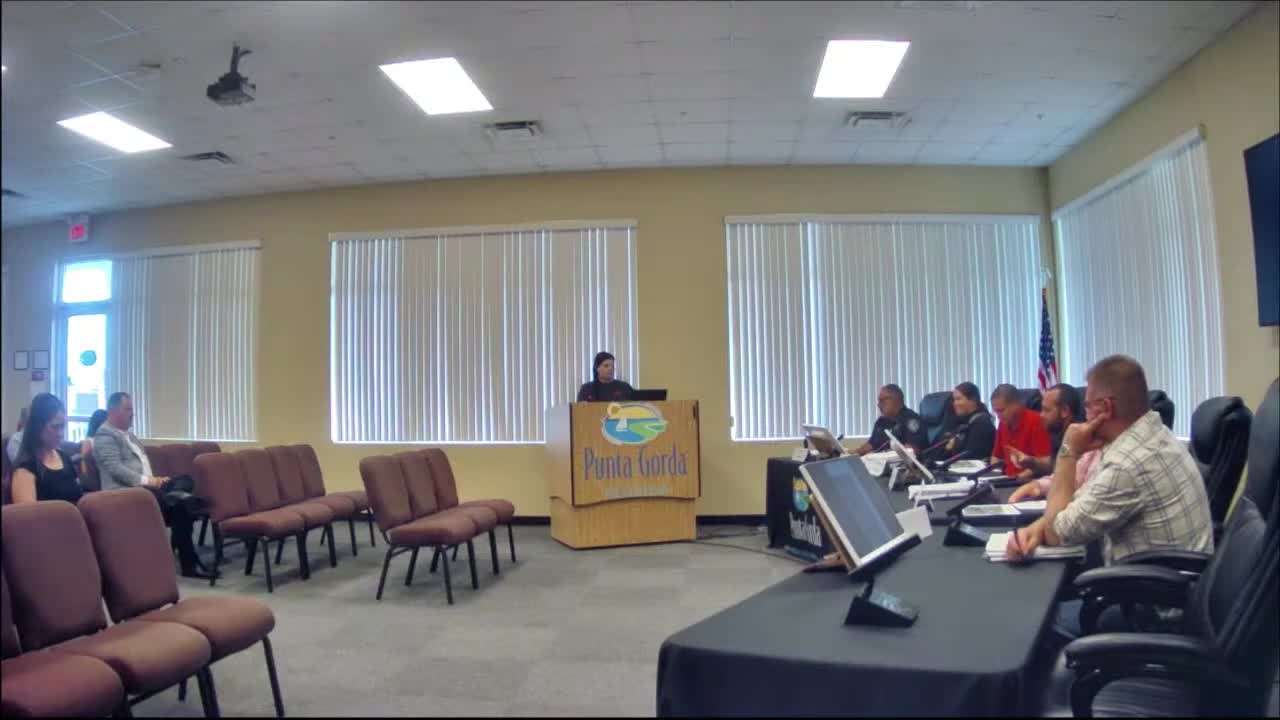 Applicant presents revised facade for proposed self-storage at 2530 Tamiami Trail; DRC sets three‑month approval window