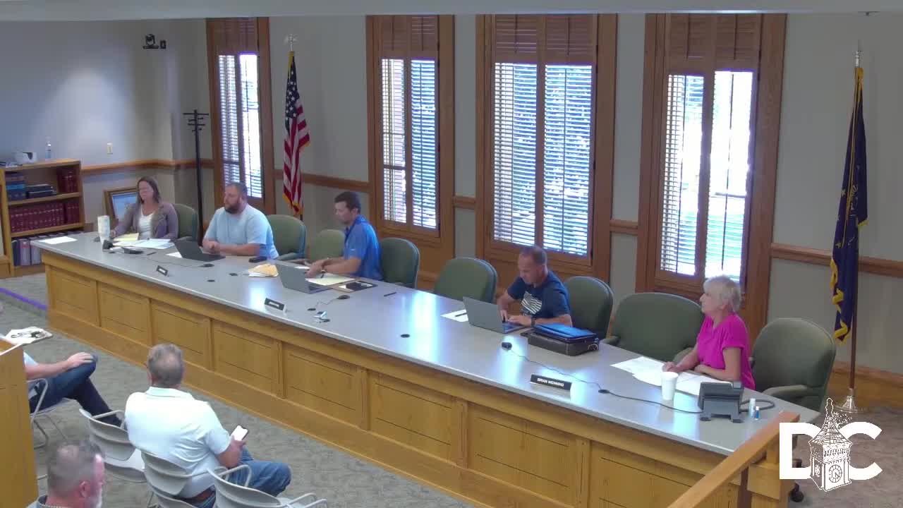 Commissioners and contractors discuss fairgrounds community building finishes, access and utilities