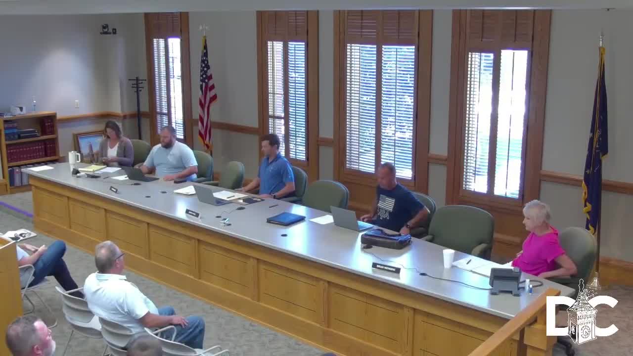 Decatur County approves oil and chip‑seal contracts after review of sealed bids