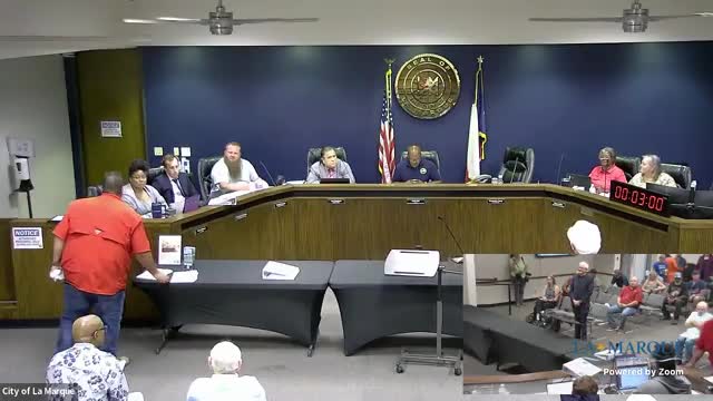 La Marque council honors Queen of Peace Catholic Church and Monsignor James B. Anderson