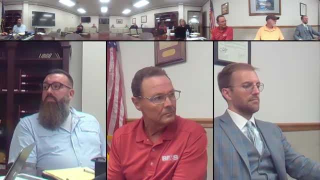 Commissioners approve stop‑sign ordinances and award highway department bids for heaters and roof work